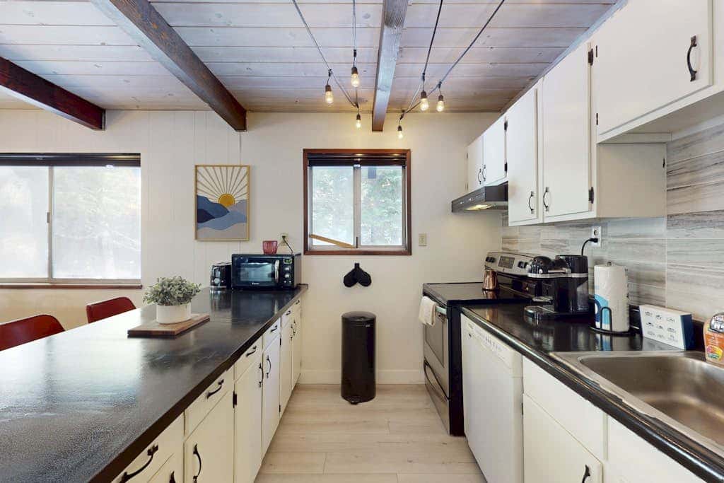 Family-friendly cabin with fireplace, bikes, loft, games, & skiing nearby