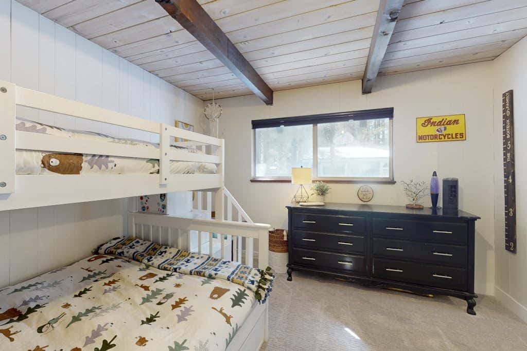 Family-friendly cabin with fireplace, bikes, loft, games, & skiing nearby