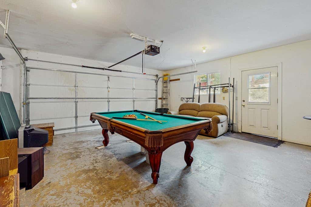 A spacious mountain retreat with a game room, forest views, and easy access to Heavenly and South Lake Tahoe.