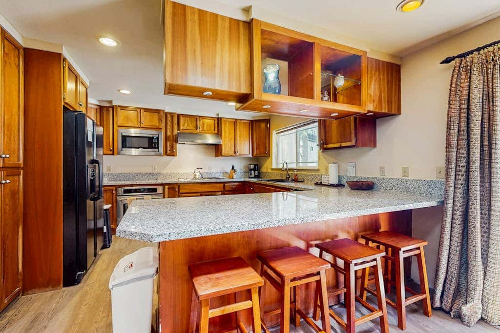 A spacious mountain retreat with a game room, forest views, and easy access to Heavenly and South Lake Tahoe.