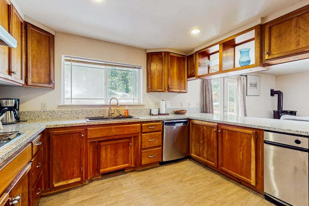 A spacious mountain retreat with a game room, forest views, and easy access to Heavenly and South Lake Tahoe.