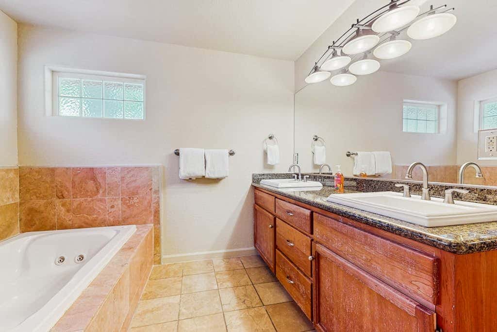 A spacious mountain retreat with a game room, forest views, and easy access to Heavenly and South Lake Tahoe.
