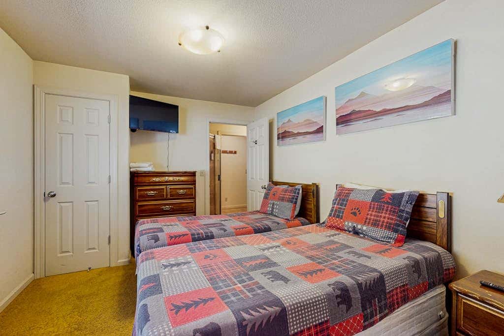 A spacious mountain retreat with a game room, forest views, and easy access to Heavenly and South Lake Tahoe.
