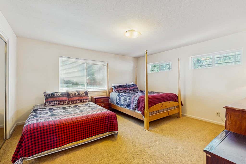 A spacious mountain retreat with a game room, forest views, and easy access to Heavenly and South Lake Tahoe.