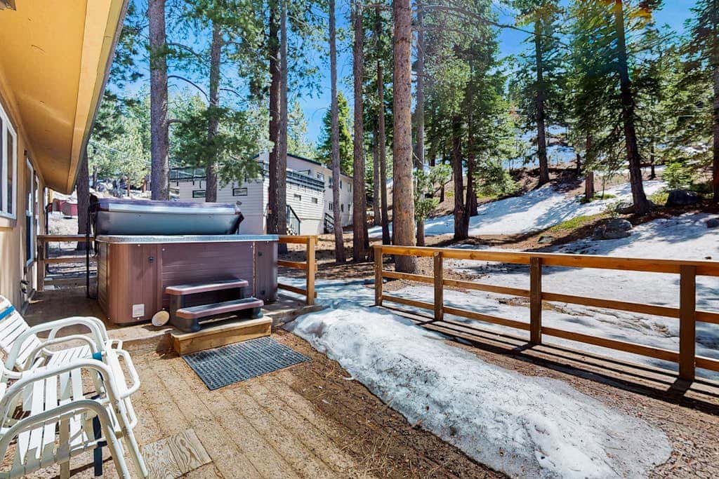 A spacious mountain retreat with a game room, forest views, and easy access to Heavenly and South Lake Tahoe.