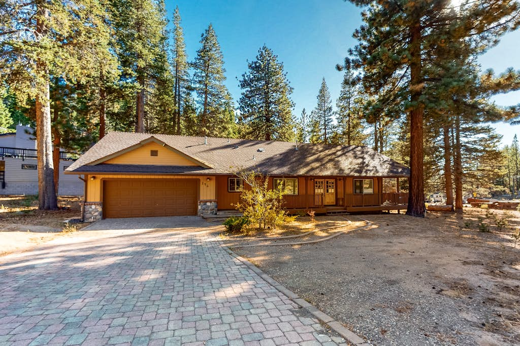 A spacious mountain retreat with a game room, forest views, and easy access to Heavenly and South Lake Tahoe.