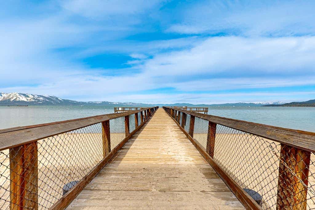 Experience Tahoe from a first-class resort with private beach access & pools