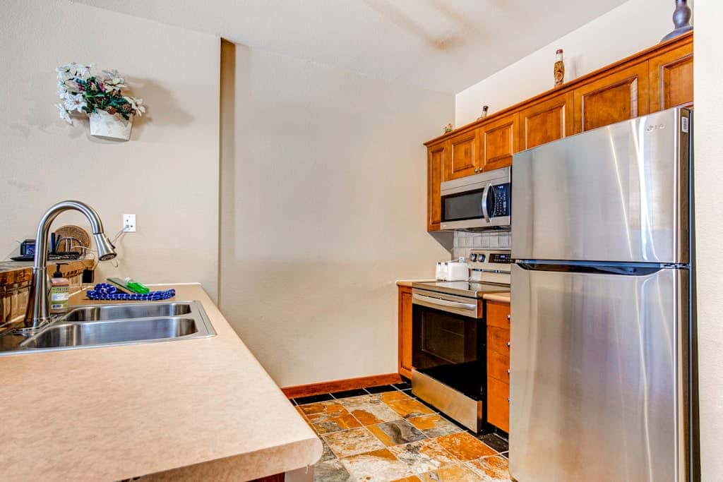 Ski-in - ski-out Powderhorn Condo with Shared Hot Tubs, a Pool & Gym at Club Solitude