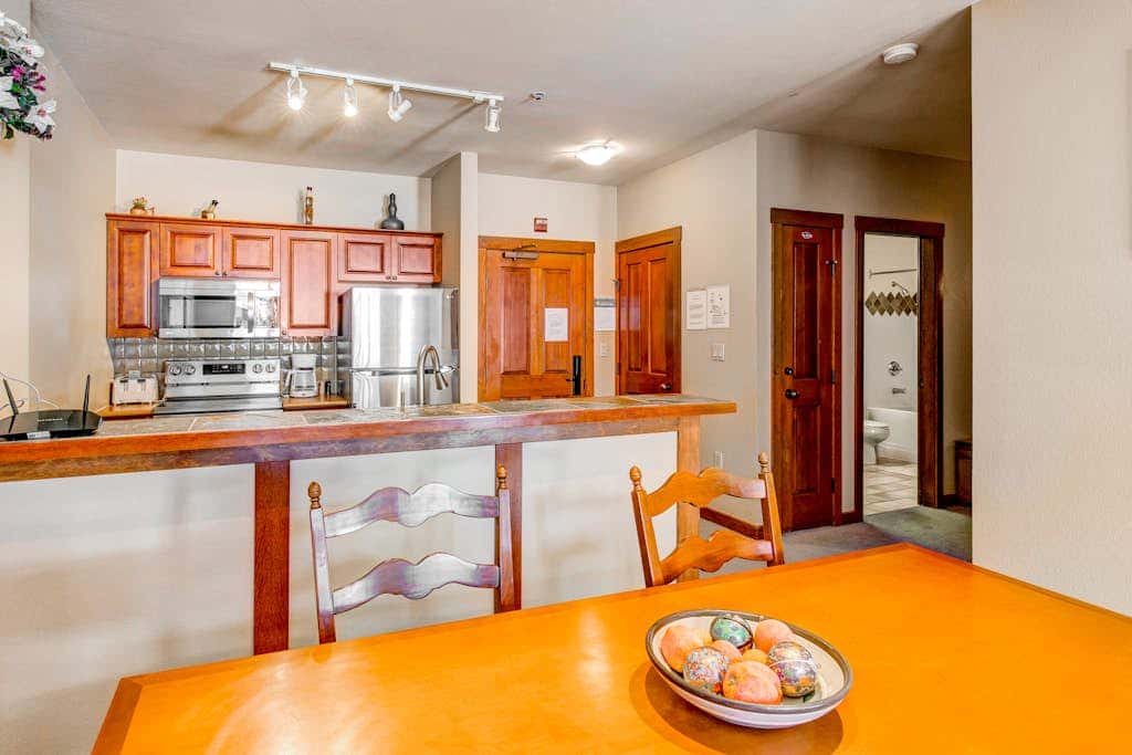 Ski-in - ski-out Powderhorn Condo with Shared Hot Tubs, a Pool & Gym at Club Solitude