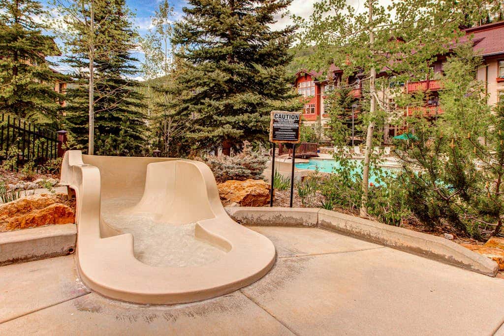 Ski-in - ski-out Powderhorn Condo with Shared Hot Tubs, a Pool & Gym at Club Solitude
