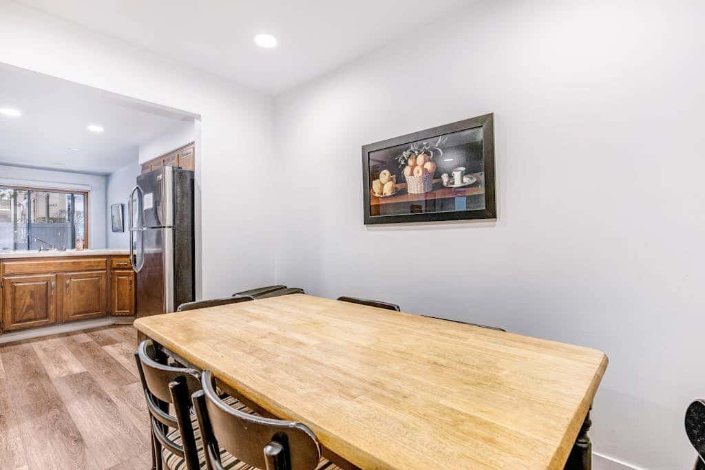 Central townhouse with private hot tub, wood fireplace, & ski shuttle access
