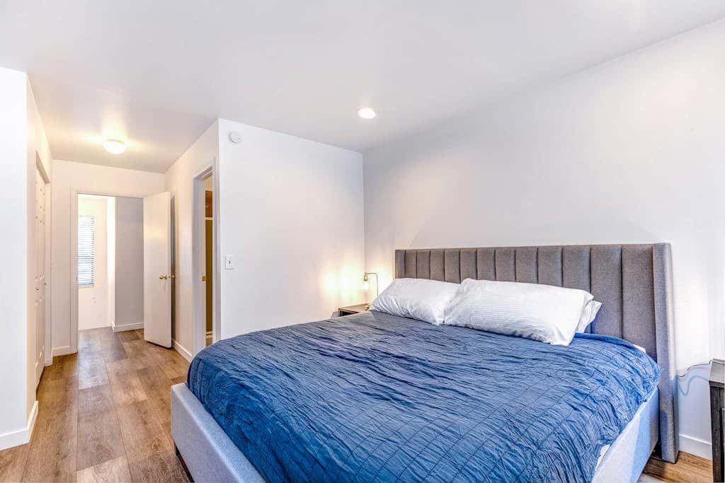 Central townhouse with private hot tub, wood fireplace, & ski shuttle access