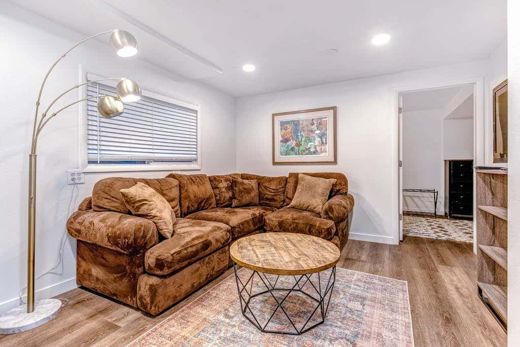 Central townhouse with private hot tub, wood fireplace, & ski shuttle access