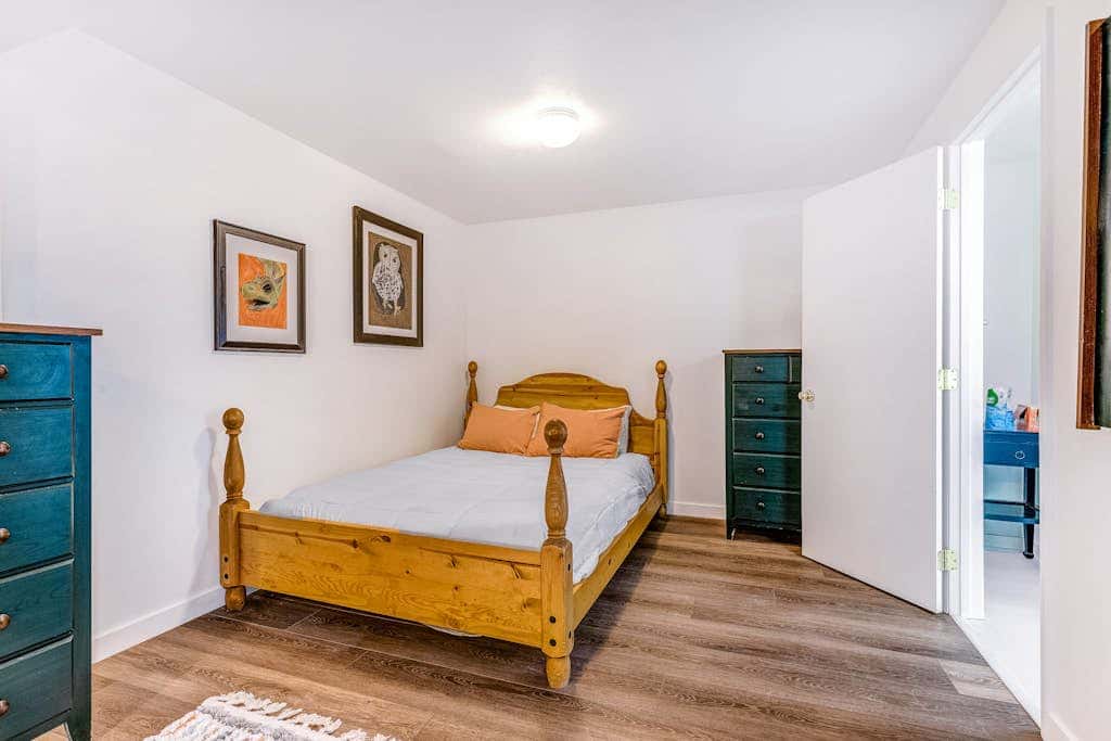 Central townhouse with private hot tub, wood fireplace, & ski shuttle access