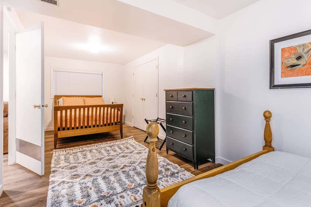 Central townhouse with private hot tub, wood fireplace, & ski shuttle access