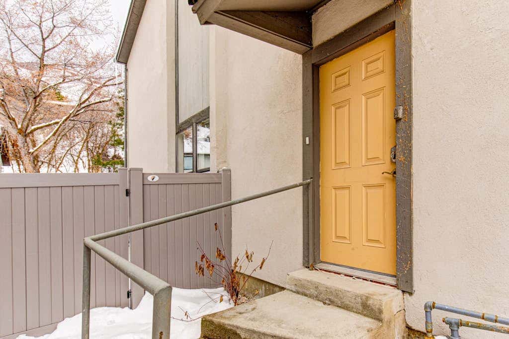 Central townhouse with private hot tub, wood fireplace, & ski shuttle access