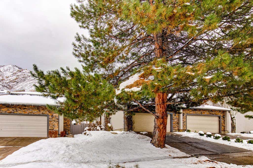 Central townhouse with private hot tub, wood fireplace, & ski shuttle access