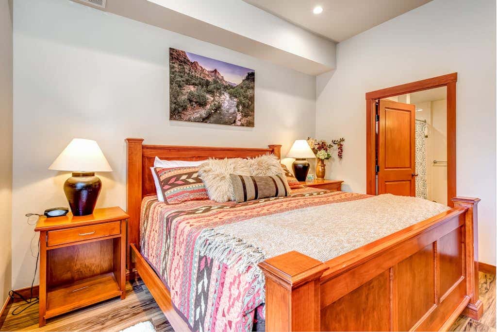 ski-in - ski-out condo with a deck, ski views & a shared pool and hot tub