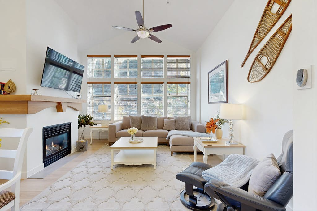 Relaxing mountain-view condo with shared hot tub, pool & more-walk to ski lifts