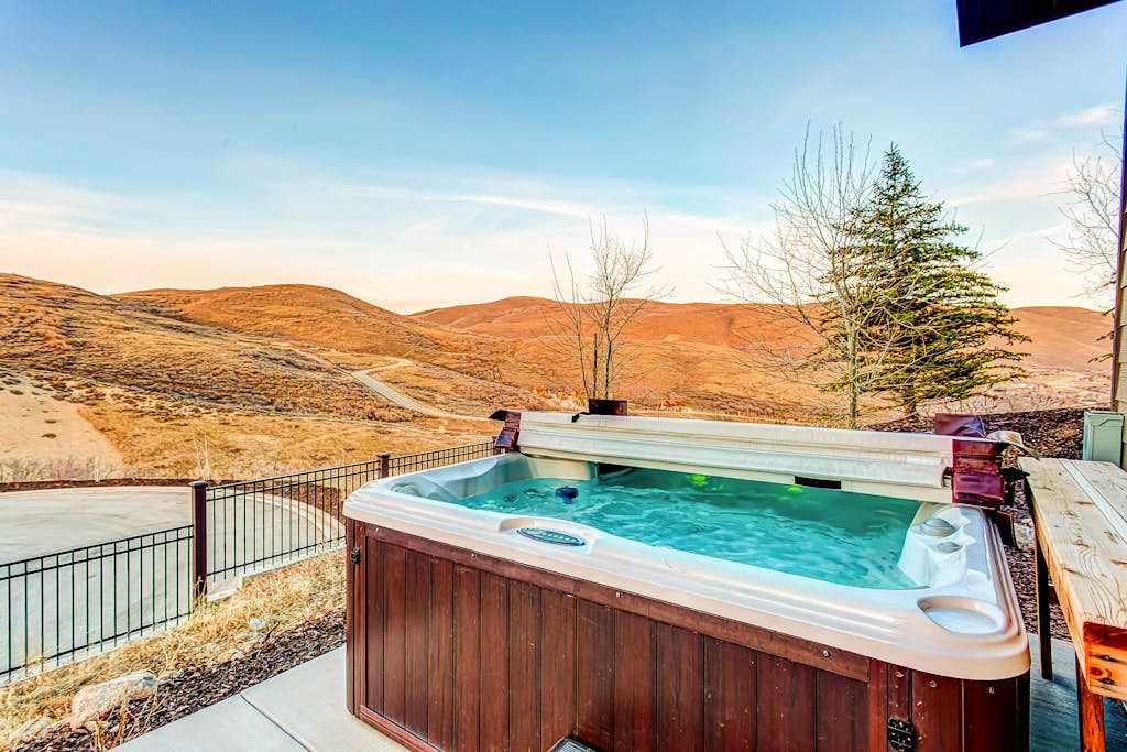 Home with  fireplace, private hot tub, shared pool, game and fitness facilities