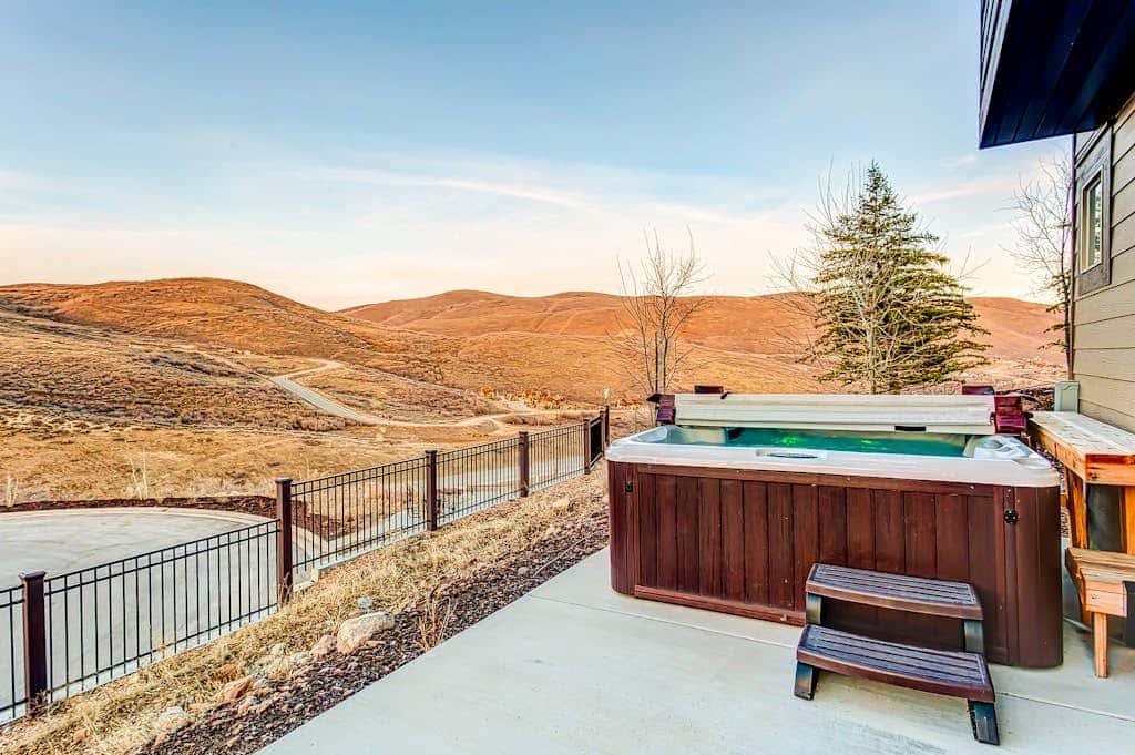 Home with  fireplace, private hot tub, shared pool, game and fitness facilities