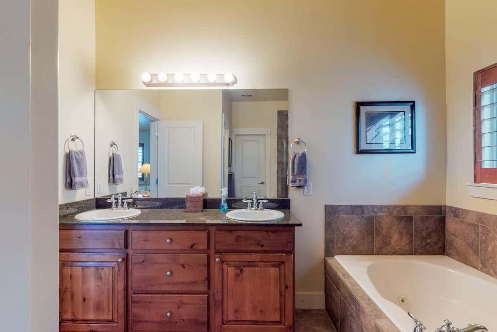 Fantastic home with fireplace, private hot tub, central AC, and pool access
