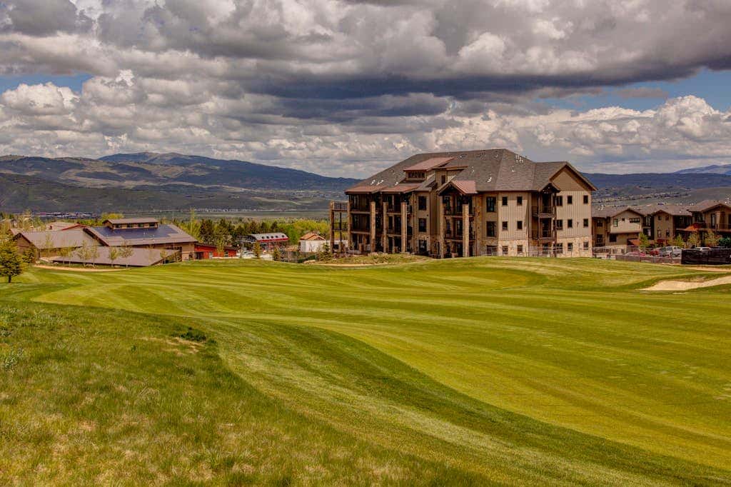 Luxury condo with large deck, pool/hot tub, walk to ski access