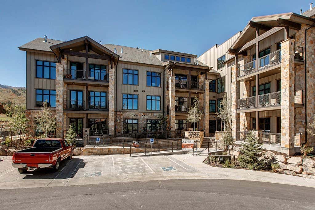 Luxury condo with large deck, pool/hot tub, walk to ski access