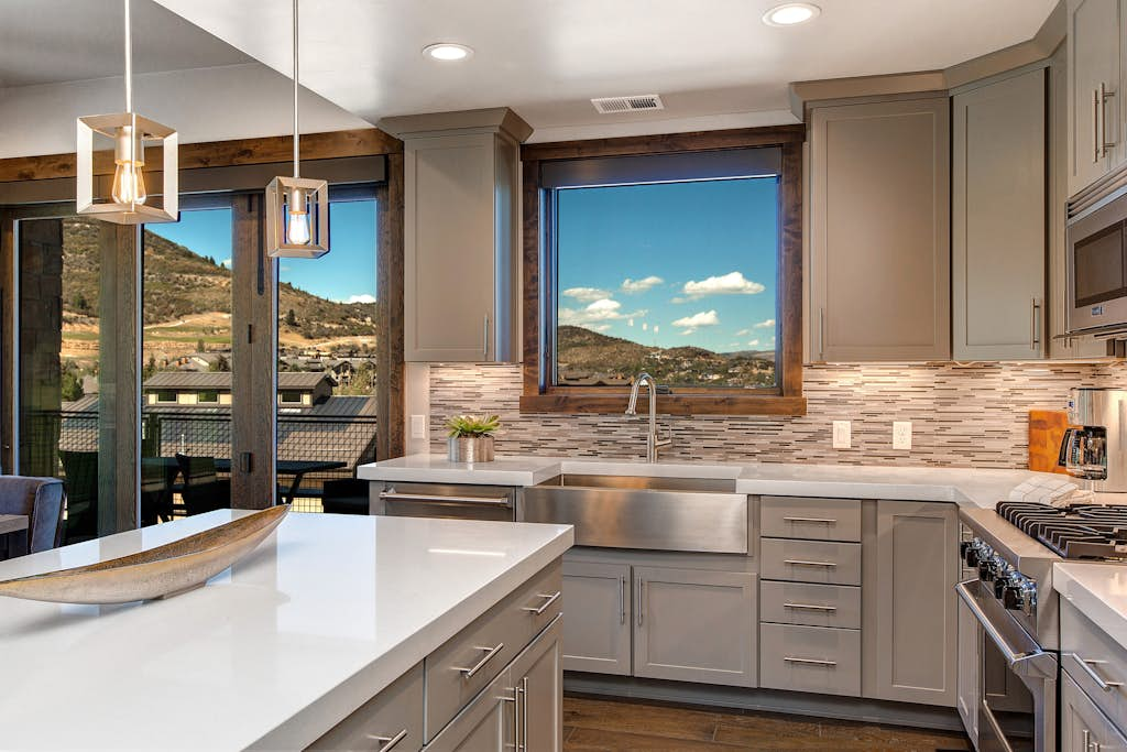 Luxury condo with large deck, pool/hot tub, walk to ski access