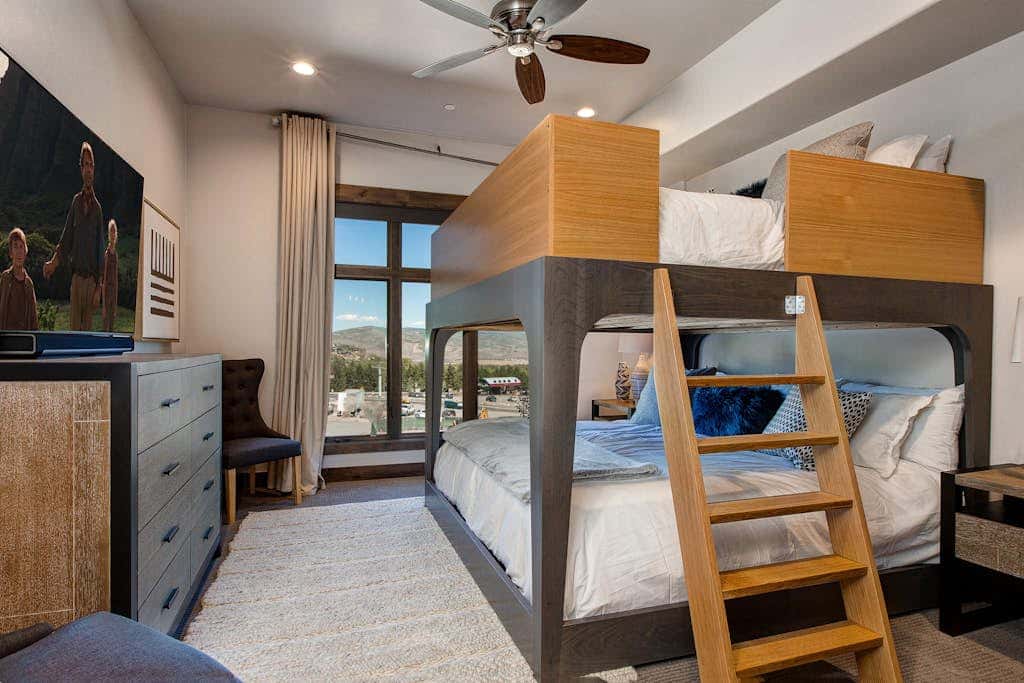 Luxury condo with large deck, pool/hot tub, walk to ski access