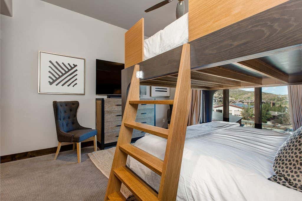 Luxury condo with large deck, pool/hot tub, walk to ski access