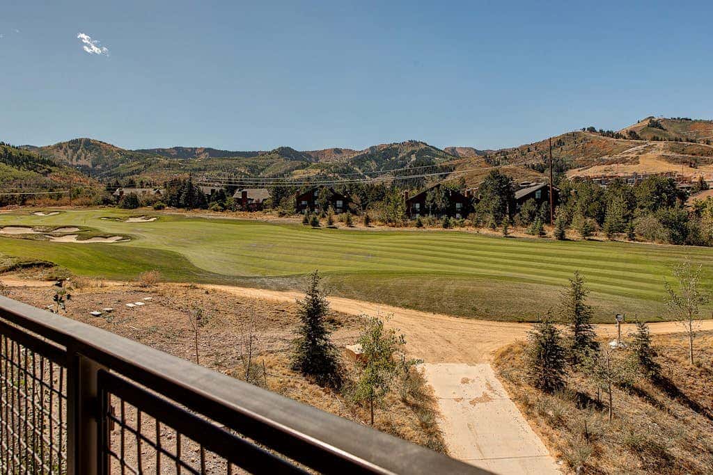 Luxury condo with large deck, pool/hot tub, walk to ski access