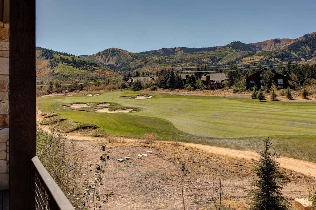 Luxury condo with large deck, pool/hot tub, walk to ski access
