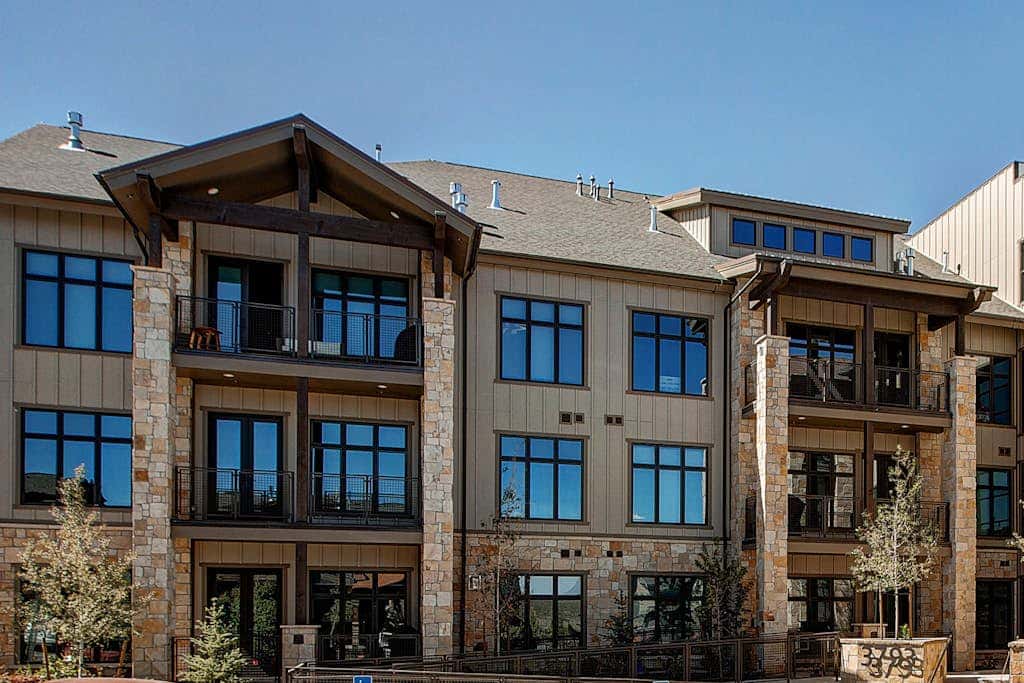 Luxury condo with large deck, pool/hot tub, walk to ski access