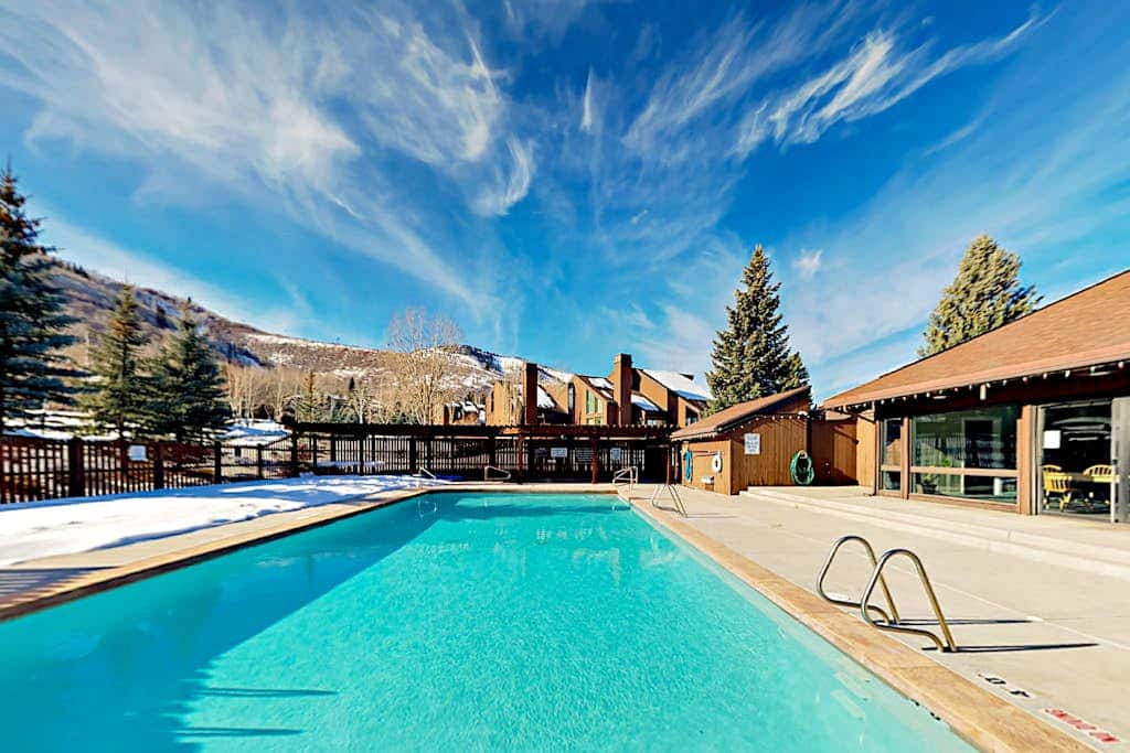 Lavish alpine escape with pool & hot tub - walk to lifts, dining & shops