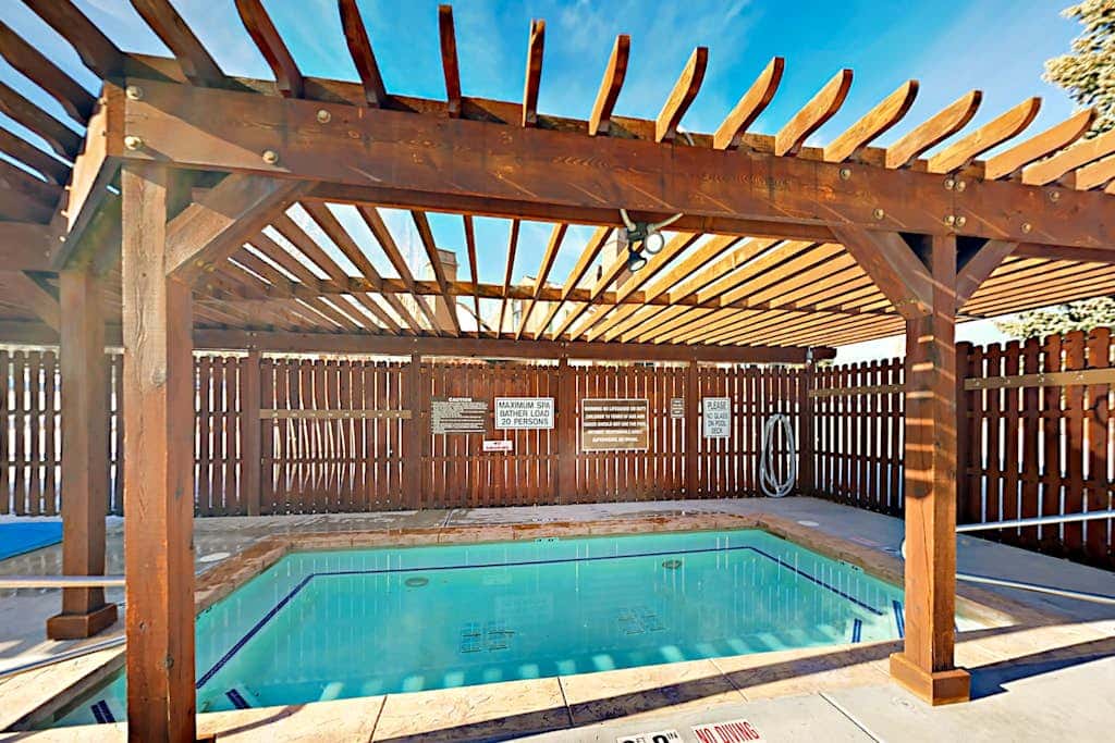 Lavish alpine escape with pool & hot tub - walk to lifts, dining & shops