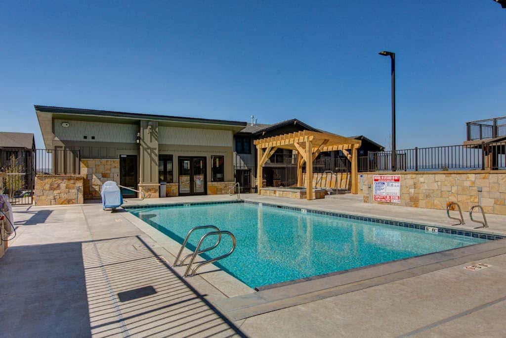 Enchanting resort condo with mountain views, hot tub, & pool - walk to lifts