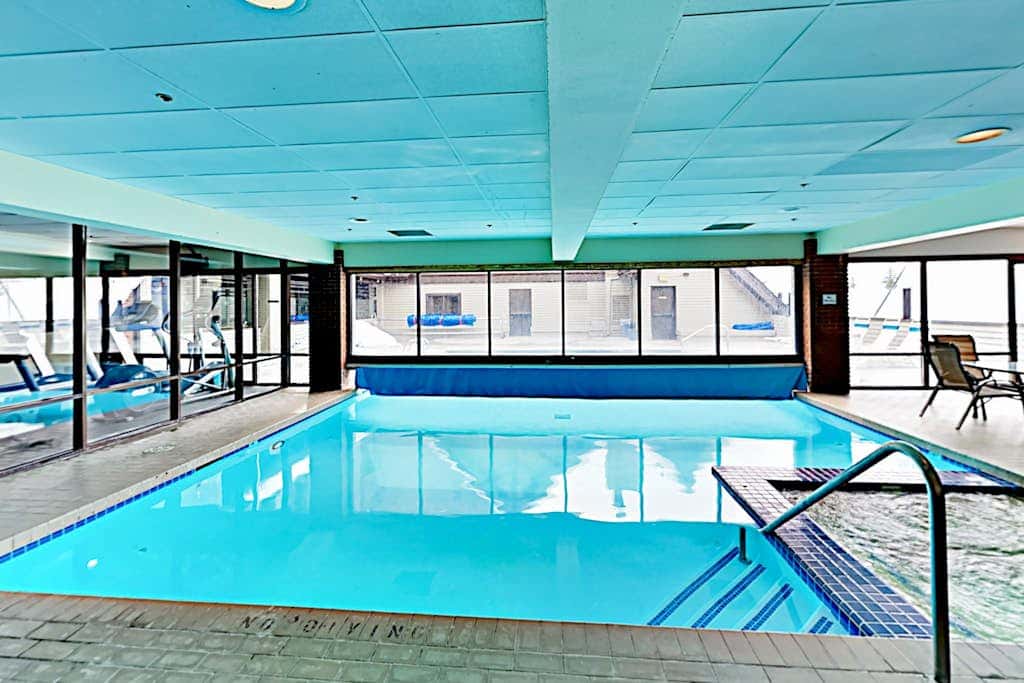 Ski-in - ski-out condo with fireplace, pool, hot tub & sauna - walk to eateries