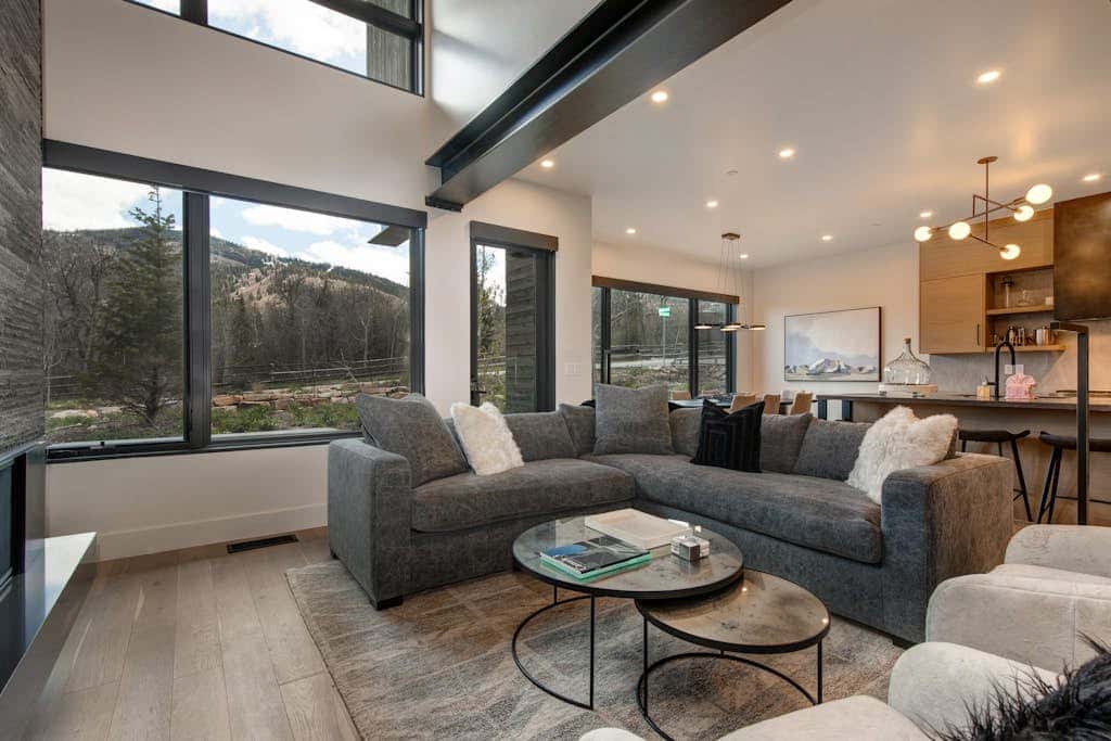 Updated home with a private hot tub, fireplace, & mountain views - dog friendly