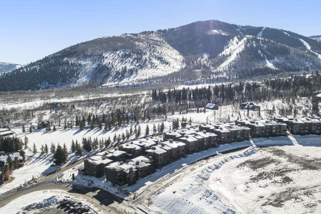 Updated home with a private hot tub, fireplace, & mountain views - dog friendly