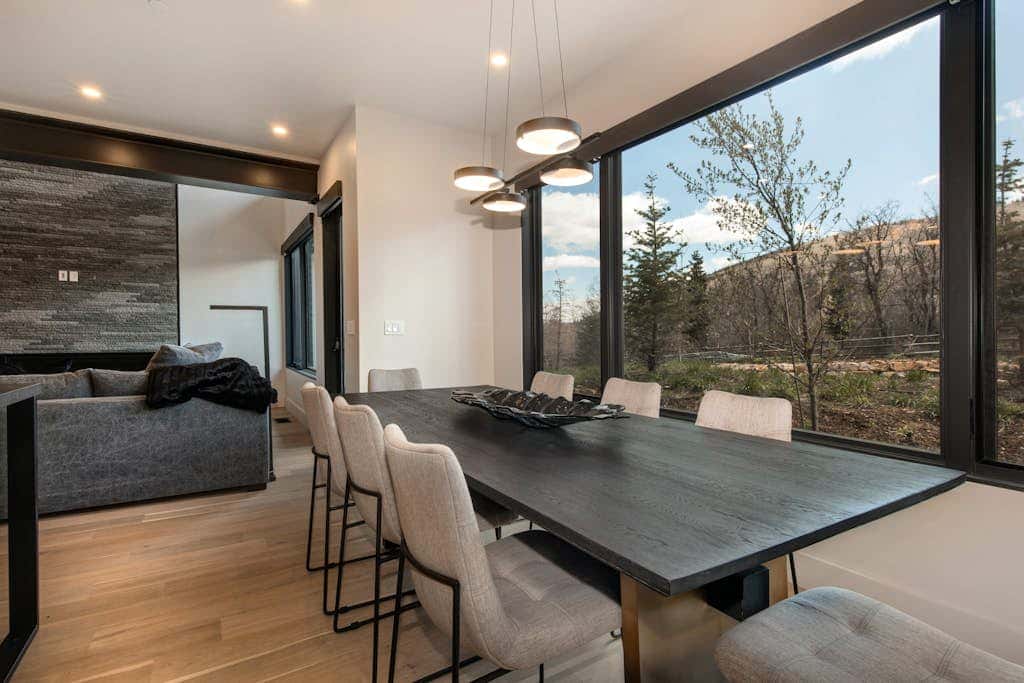 Updated home with a private hot tub, fireplace, & mountain views - dog friendly