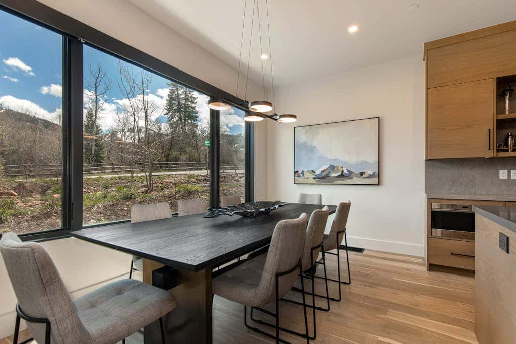 Updated home with a private hot tub, fireplace, & mountain views - dog friendly