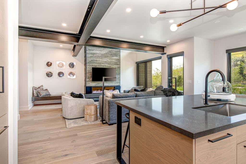 Updated home with a private hot tub, fireplace, & mountain views - dog friendly