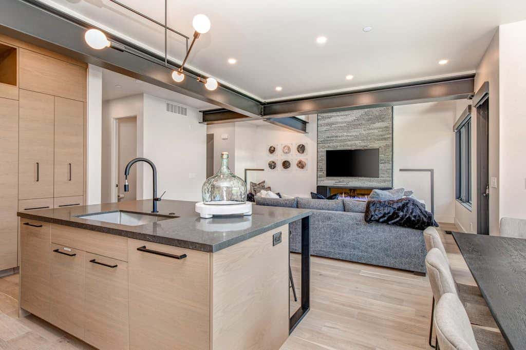 Updated home with a private hot tub, fireplace, & mountain views - dog friendly