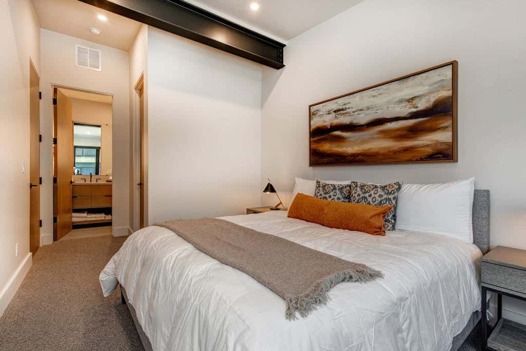 Updated home with a private hot tub, fireplace, & mountain views - dog friendly