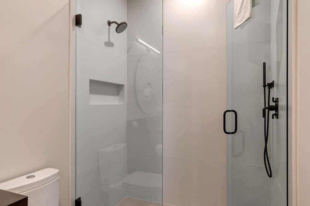 Updated home with a private hot tub, fireplace, & mountain views - dog friendly