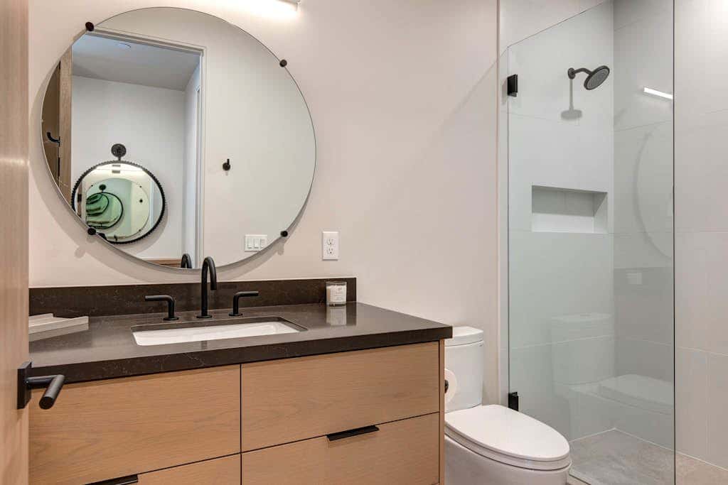 Updated home with a private hot tub, fireplace, & mountain views - dog friendly