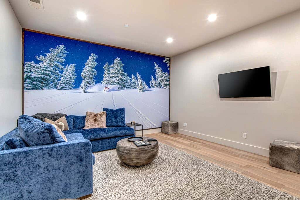 Updated home with a private hot tub, fireplace, & mountain views - dog friendly