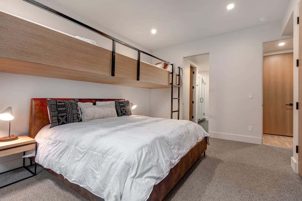 Updated home with a private hot tub, fireplace, & mountain views - dog friendly