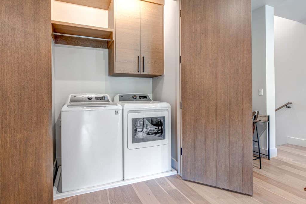 Updated home with a private hot tub, fireplace, & mountain views - dog friendly